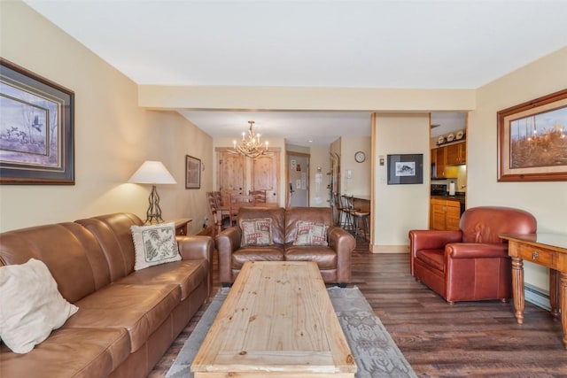 living area with baseboard heating, a chandelier, and dark wood-type flooring