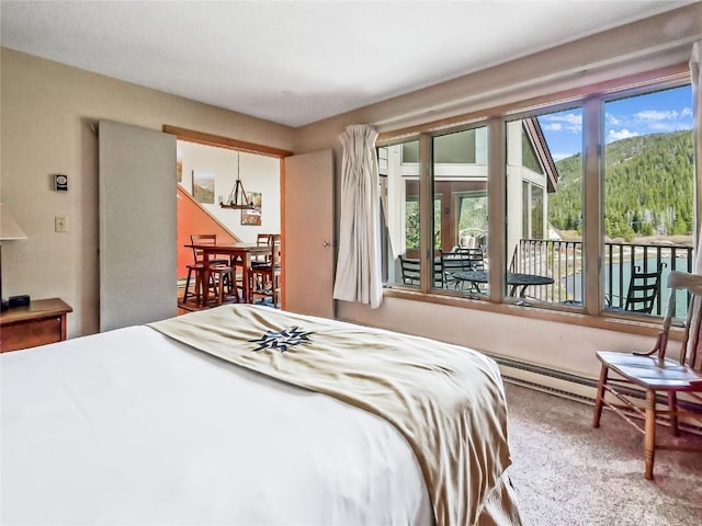 22280 US Highway 6 Unit 1717, Keystone, CO 80435 - carpeted bedroom with a chandelier