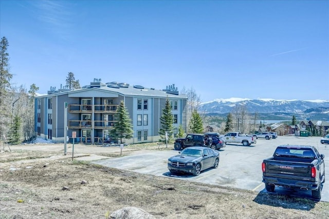 8300 Ryan Gulch Rd Unit F306, Silverthorne, CO 80498 - uncovered parking lot with a mountain view