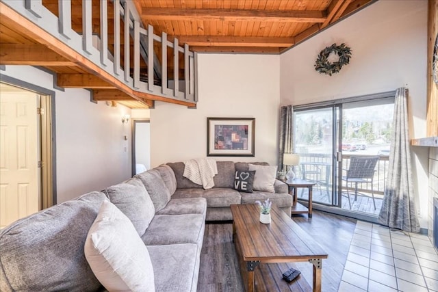 8300 Ryan Gulch Rd Unit F306, Silverthorne, CO 80498 - living area with wooden ceiling and beam ceiling