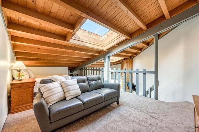 8300 Ryan Gulch Rd Unit F306, Silverthorne, CO 80498 - living area with wooden ceiling, a skylight, beam ceiling, and carpet flooring