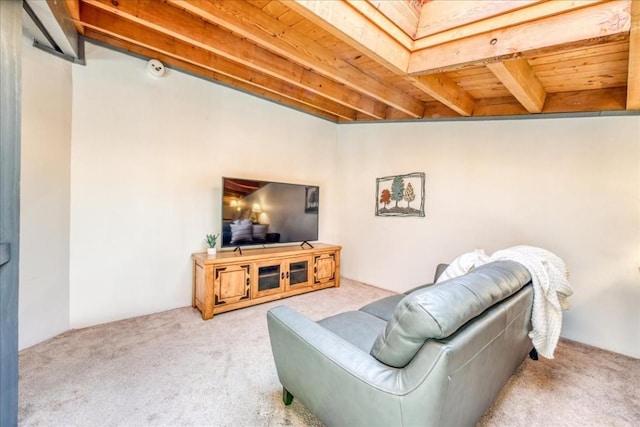 8300 Ryan Gulch Rd Unit F306, Silverthorne, CO 80498 - carpeted living area with beam ceiling