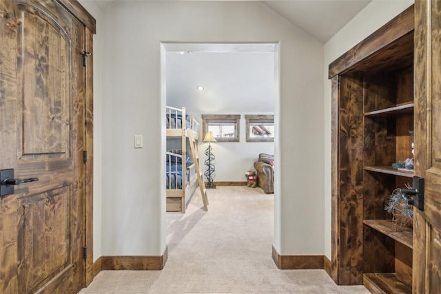 28 Tieze Ln, Keystone, CO 80435 - hall featuring carpet floors, lofted ceiling, and stairway