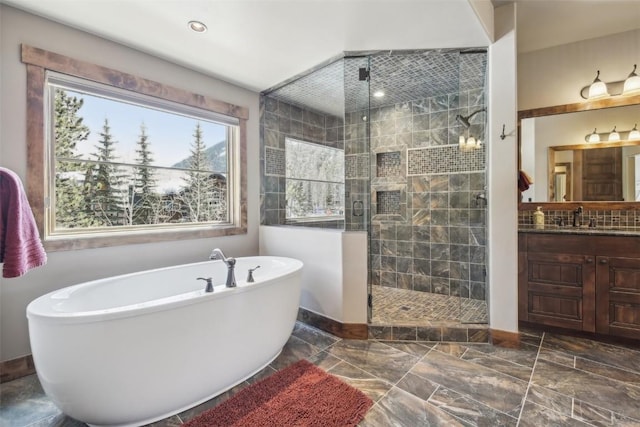 28 Tieze Ln, Keystone, CO 80435 - bathroom with a freestanding tub, a shower stall, and vanity
