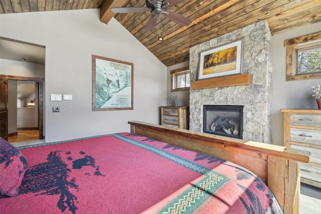 28 Tieze Ln, Keystone, CO 80435 - bedroom featuring wood ceiling, lofted ceiling, a fireplace, and a ceiling fan