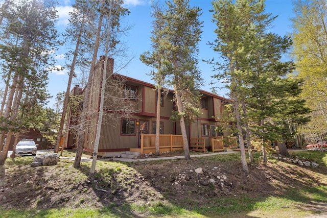 160 Creekside Dr Unit 3, Frisco, CO 80443 - rear view of property with a chimney