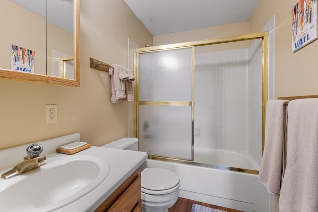 160 Creekside Dr Unit 3, Frisco, CO 80443 - full bathroom featuring toilet, enclosed tub / shower combo, vanity, and wood finished floors