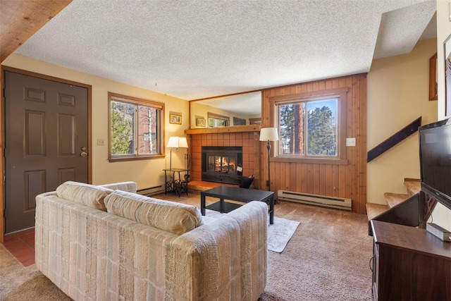 160 Creekside Dr Unit 3, Frisco, CO 80443 - living area featuring a baseboard heating unit, carpet, healthy amount of natural light, a textured ceiling, and wooden walls