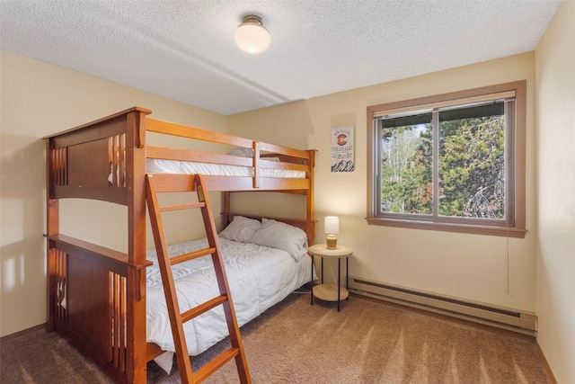 160 Creekside Dr Unit 3, Frisco, CO 80443 - bedroom featuring a baseboard radiator, carpet, and a textured ceiling