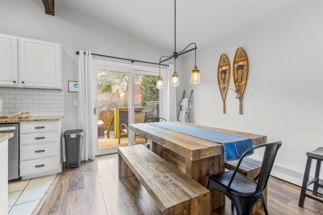821 Pitkin St Unit 8, Frisco, CO 80443 - dining room featuring lofted ceiling and light wood finished floors