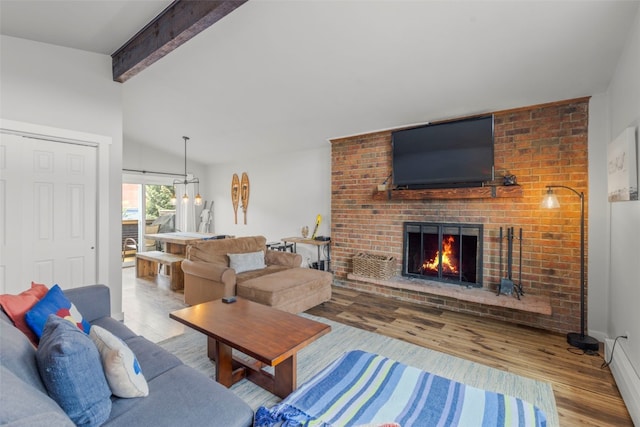 821 Pitkin St Unit 8, Frisco, CO 80443 - living area with wood finished floors and a brick fireplace