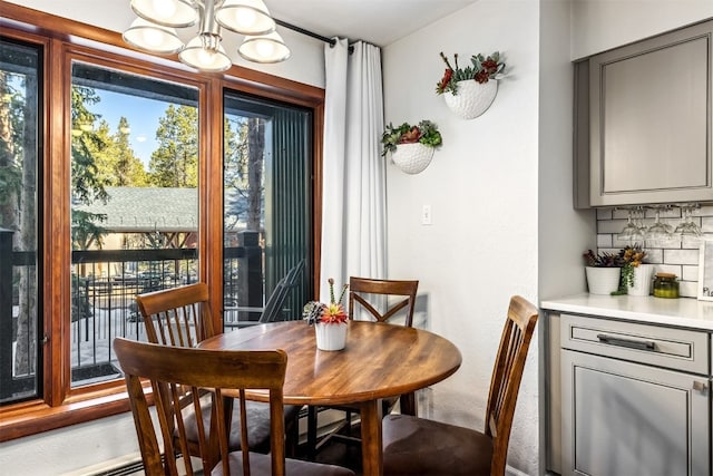 dining area with a chandelier