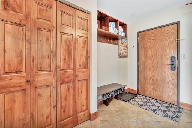 1995 Storm Meadows Dr Unit 307, Steamboat Springs, CO 80487 - mudroom with baseboards and light tile patterned floors