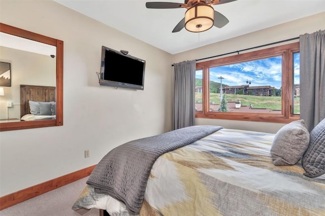 1995 Storm Meadows Dr Unit 307, Steamboat Springs, CO 80487 - carpeted bedroom featuring baseboards and a ceiling fan