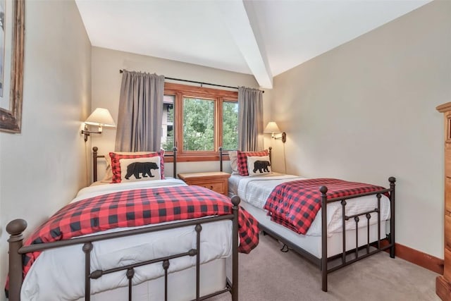 1995 Storm Meadows Dr Unit 307, Steamboat Springs, CO 80487 - bedroom featuring beam ceiling and carpet floors