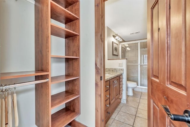 1995 Storm Meadows Dr Unit 307, Steamboat Springs, CO 80487 - bathroom featuring vanity, a shower stall, and tile patterned floors