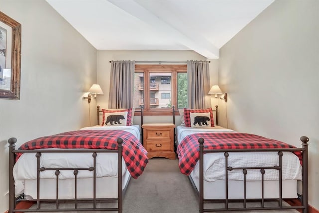1995 Storm Meadows Dr Unit 307, Steamboat Springs, CO 80487 - carpeted bedroom featuring vaulted ceiling