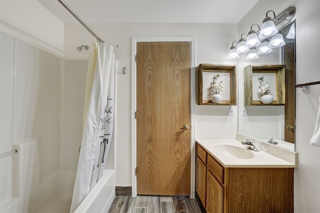 307 Saddle Ridge Dr Unit 307, Wildernest, CO 80498 - bathroom with vanity, wood finished floors, and shower / bath combo with shower curtain