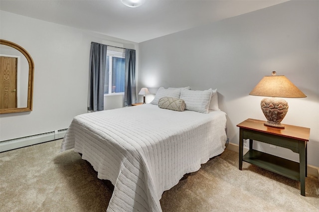 307 Saddle Ridge Dr Unit 307, Wildernest, CO 80498 - bedroom with carpet floors and a baseboard heating unit