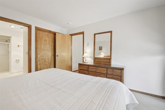 210 E Ln Bonte St Unit 121, Dillon, CO 80435 - carpeted bedroom with connected bathroom and a closet