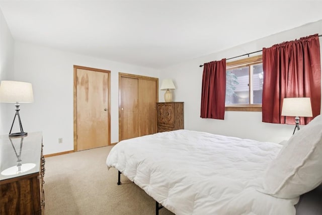 210 E Ln Bonte St Unit 121, Dillon, CO 80435 - bedroom with carpet flooring and two closets