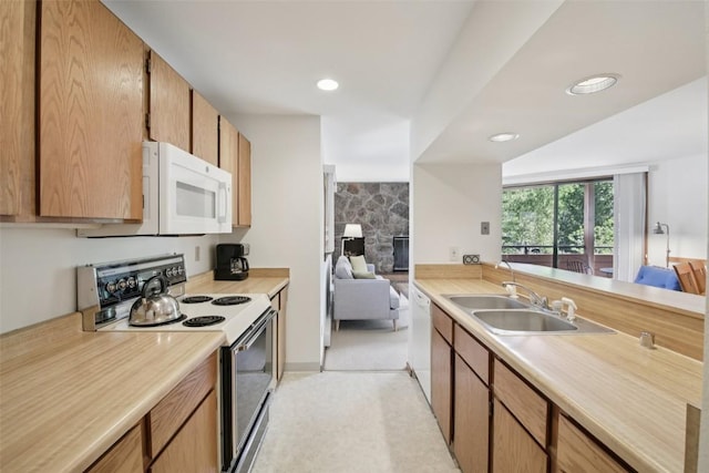 210 E Ln Bonte St Unit 121, Dillon, CO 80435 - kitchen featuring white appliances, light countertops, and recessed lighting