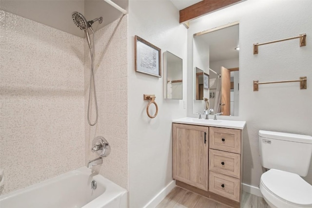210 E Ln Bonte St Unit 121, Dillon, CO 80435 - bathroom featuring wood finished floors,  shower combination, and vanity