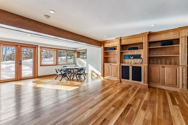 252 Lake View Dr, Silverthorne, CO 80498 - living room featuring french doors, light wood-type flooring, recessed lighting, beam ceiling, and baseboards