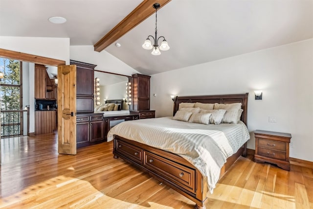 252 Lake View Dr, Silverthorne, CO 80498 - bedroom featuring light wood-style floors, a chandelier, and baseboards