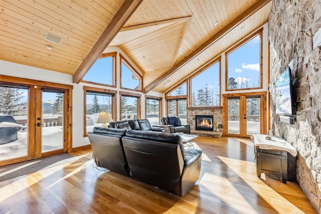 252 Lake View Dr, Silverthorne, CO 80498 - living area with a fireplace, high vaulted ceiling, hardwood / wood-style floors, french doors, and wooden ceiling with exposed beams