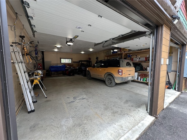 36 Silk Sisters Pl, Fairplay, CO 80440 - garage featuring a garage door opener