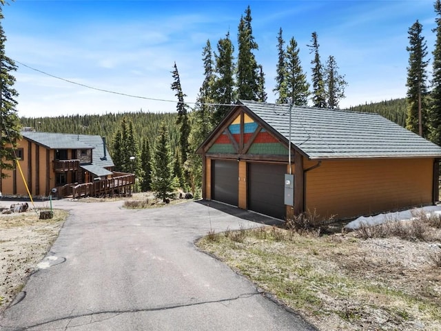 36 Silk Sisters Pl, Fairplay, CO 80440 - detached garage featuring a view of trees