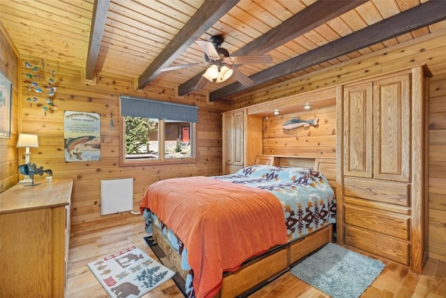 36 Silk Sisters Pl, Fairplay, CO 80440 - bedroom featuring light wood finished floors, wood ceiling with exposed beams, and wood walls