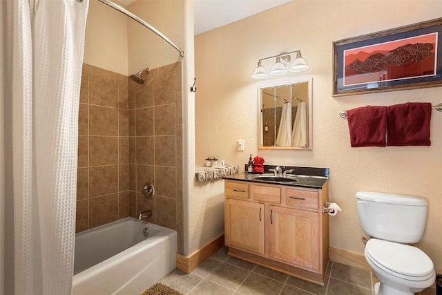 full bath with tile patterned floors, shower / bath combo with shower curtain, baseboards, and toilet