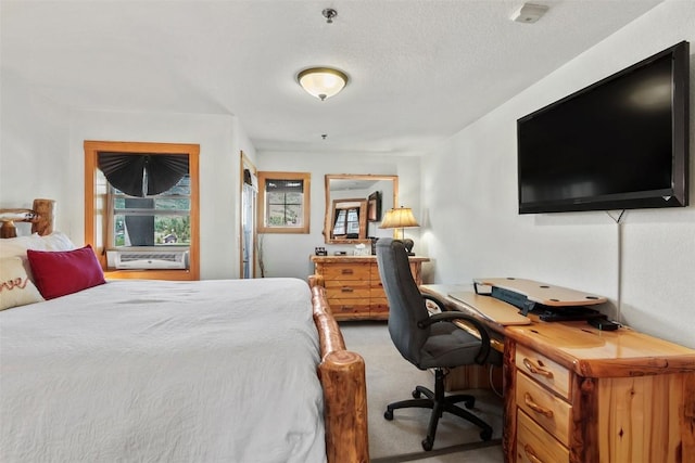 bedroom with light carpet
