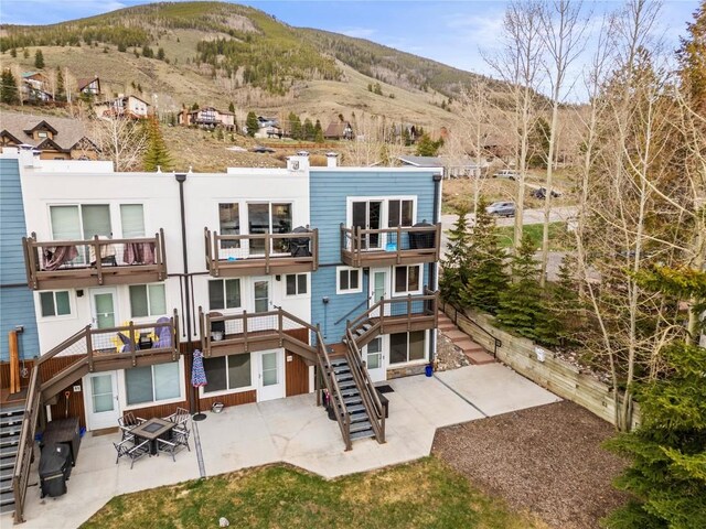 414 Tenderfoot St Unit 1, Dillon, CO 80435 - view of property featuring stairway and a mountain view