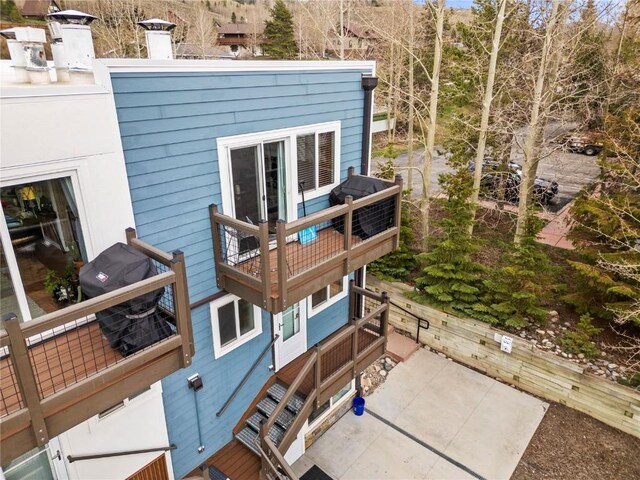 414 Tenderfoot St Unit 1, Dillon, CO 80435 - rear view of property featuring a balcony