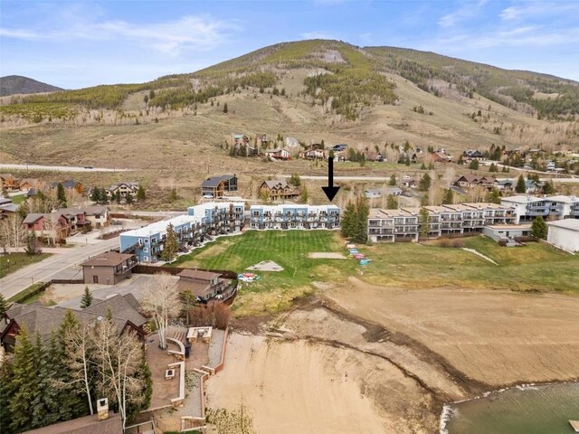 414 Tenderfoot St Unit 1, Dillon, CO 80435 - aerial overview of property's location with mountains and nearby suburban area