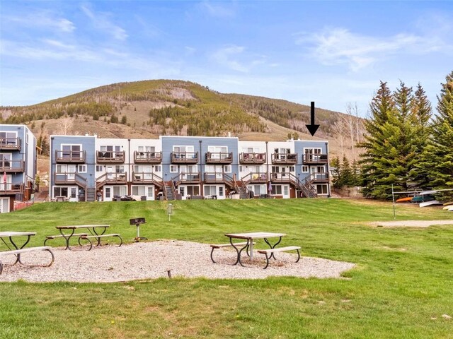 414 Tenderfoot St Unit 1, Dillon, CO 80435 - surrounding community featuring a mountain view and a yard