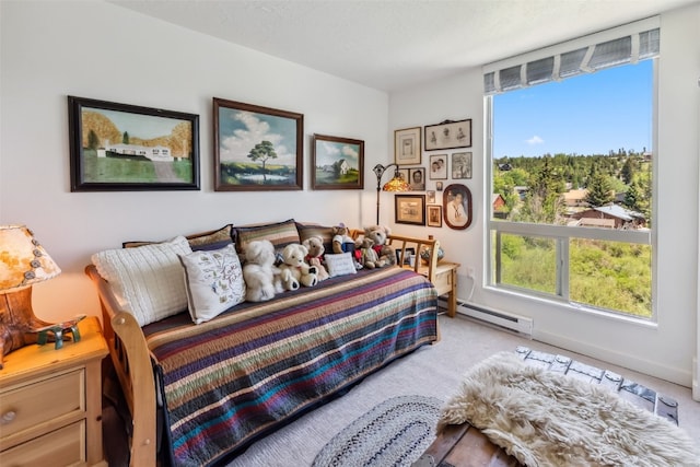 340 Straight Creek Dr Unit 206, Dillon, CO 80435 - carpeted bedroom with baseboard heating and multiple windows