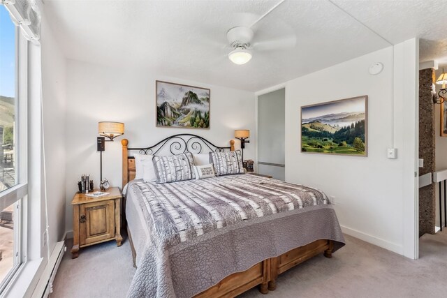 340 Straight Creek Dr Unit 206, Dillon, CO 80435 - carpeted bedroom featuring baseboards and a ceiling fan