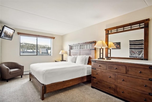 611 Village Rd Unit 21170, Breckenridge, CO 80424 - bedroom with a baseboard heating unit and light colored carpet