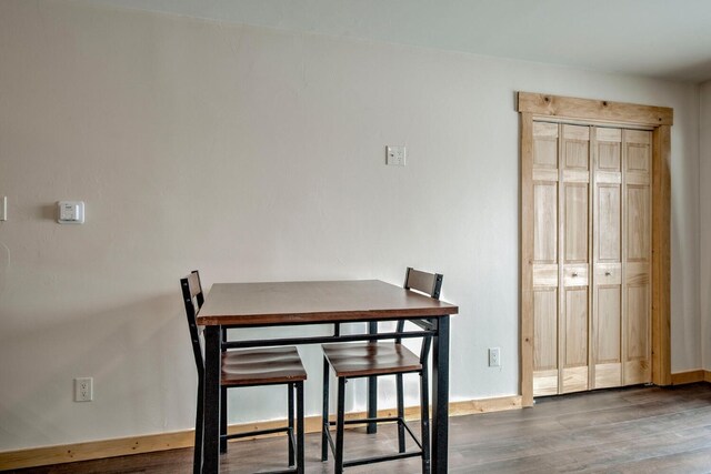 dining area featuring hardwood / wood-style flooring