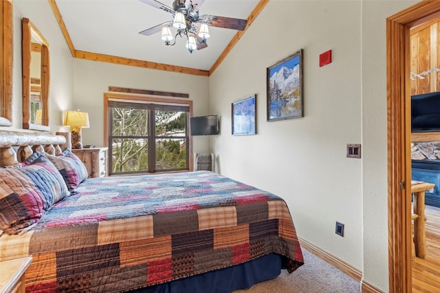22714 US Highway 6 Unit 5977, Keystone, CO 80435 - carpeted bedroom with vaulted ceiling, baseboards, a ceiling fan, and ornamental molding