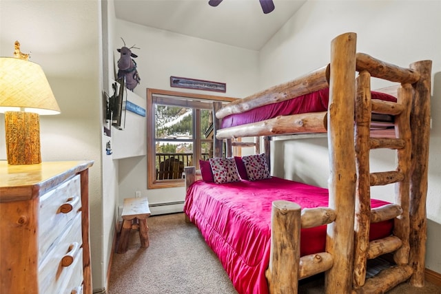 22714 US Highway 6 Unit 5977, Keystone, CO 80435 - carpeted bedroom with a baseboard heating unit and ceiling fan