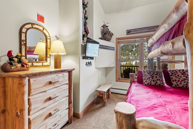 22714 US Highway 6 Unit 5977, Keystone, CO 80435 - bedroom featuring baseboard heating, carpet floors, and baseboards