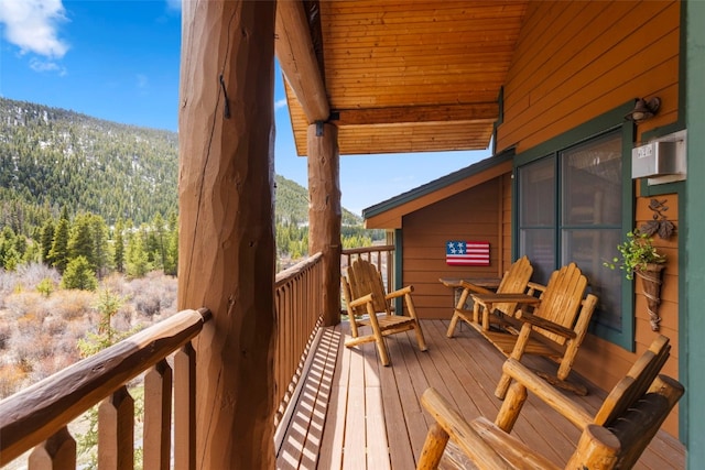 22714 US Highway 6 Unit 5977, Keystone, CO 80435 - wooden deck with a wooded view