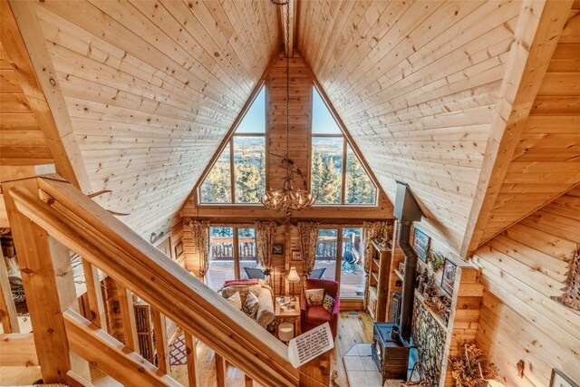 672 Wampum Ln, Como, CO 80432 - full bathroom featuring a skylight, a shower stall, toilet, and wood finished floors