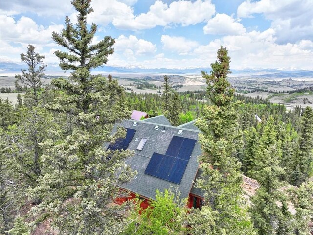 672 Wampum Ln, Como, CO 80432 - dining area featuring wooden ceiling, healthy amount of natural light, and a chandelier