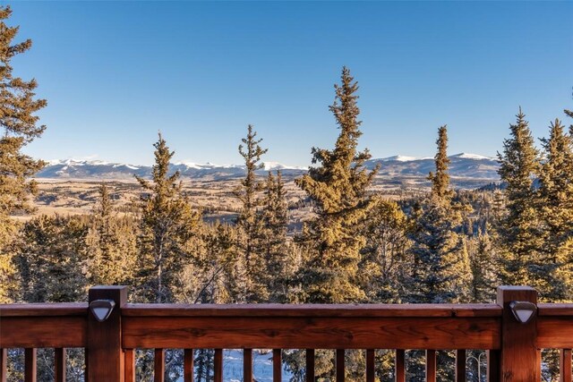 672 Wampum Ln, Como, CO 80432 - deck at dusk with outdoor dining area and a grill